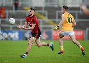 26 May 2018; Connaire Harrison of Down  in action against Mark Sweeney of Antrim during the Ulster GAA Football Senior Championship Quarter-Final match between Down and Antrim at Pairc Esler in Newry, Down. Photo by Oliver McVeigh/Sportsfile