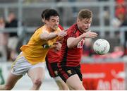 26 May 2018; Caolan Mooney of Down in action against Niall McKeever of Antrim during the Ulster GAA Football Senior Championship Quarter-Final match between Down and Antrim at Pairc Esler in Newry, Down. Photo by Oliver McVeigh/Sportsfile