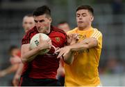 26 May 2018; Niall McParland of Down in action against Patrick McBride of Antrim during the Ulster GAA Football Senior Championship Quarter-Final match between Down and Antrim at Pairc Esler in Newry, Down. Photo by Oliver McVeigh/Sportsfile