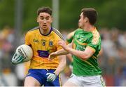 26 May 2018; Cathal Compton of Roscommon in action against Ryan O'Rourke of Leitrim during the Connacht GAA Football Senior Championship semi-final match between Leitrim and Roscommon at Páirc Seán Mac Diarmada in Carrick-on-Shannon, Leitrim. Photo by Piaras Ó Mídheach/Sportsfile