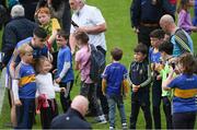 26 May 2018; Michael Quinlivan of Tipperary poses for a picture with young supporters following the Munster GAA Football Senior Championship semi-final match between Tipperary and Cork at Semple Stadium in Thurles, County Tipperary. Photo by Eóin Noonan/Sportsfile