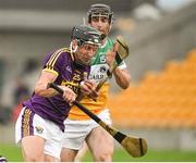 26 May 2018; Liam Og McGovern of Wexford in action against Dan Currams of Offaly during the Leinster GAA Hurling Senior Championship Round 3 match between Offaly and Wexford at Bord na Mona O'Connor Park in Tullamore, Offaly. Photo by Matt Browne/Sportsfile