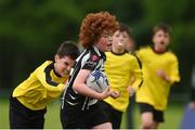 26 May 2018; Myles McNamara of Kilcullen, Co. Kildare, is tackled by Finnán O'Mahony of Rosses Point, Co. Sligo, during the Mini Rugby event. Over 3,500 children took part in Aldi Community Games May Festival on a sun-drenched, fun-filled weekend in University of Limerick from 26th to 27th May. Photo by Diarmuid Greene/Sportsfile