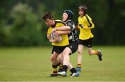 26 May 2018; Marc Clifford of Rosses Point, Co. Sligo, in action against Rhys Byrne of Kilcullen, Co. Kildare, during the Mini Rugby event. Over 3,500 children took part in Aldi Community Games May Festival on a sun-drenched, fun-filled weekend in University of Limerick from 26th to 27th May. Photo by Diarmuid Greene/Sportsfile