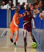 27 May 2018; Daire Hill, from Ballynacally-Lissycasey, Co. Clare, left, and  Niall Kenny, from Riverstown, Co. Sligo, competing in the Indoor Soccer U13 & O10 Boys event during during Day 2 of the Aldi Community Games May Festival, which saw over 3,500 children take part in a fun-filled weekend at University of Limerick from 26th to 27th May.  Photo by Sam Barnes/Sportsfile