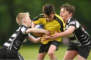 26 May 2018; Marc Clifford of Rosses Point, Co. Sligo, in action against Oscar Monks, left, and Jamie Bohan of Kilcullen, Co. Kildare, during the Mini Rugby event. Over 3,500 children took part in Aldi Community Games May Festival on a sun-drenched, fun-filled weekend in University of Limerick from 26th to 27th May. Photo by Diarmuid Greene/Sportsfile