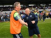 27 May 2018; Clare joint manager Donal Moloney is congratulated by the Waterford manager, Derek McGrath, right, after the Munster GAA Hurling Senior Championship Round 2 match between Clare and Waterford at Cusack Park in Ennis, Co Clare. Photo by Ray McManus/Sportsfile