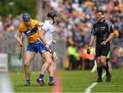 27 May 2018; Referee Paud O'Dwyer calls for order as David Fitzgerald of Clare and Shane McNulty of Waterford jostle during the Munster GAA Hurling Senior Championship Round 2 match between Clare and Waterford at Cusack Park in Ennis, Co Clare. Photo by Ray McManus/Sportsfile