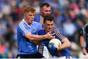 27 May 2018; Cathal Magee of Wicklow is tackled by Conor McHugh of Dublin during the Leinster GAA Football Senior Championship Quarter-Final match between Wicklow and Dublin at O'Moore Park in Portlaoise, Co Laois. Photo by Ramsey Cardy/Sportsfile