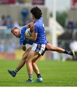27 May 2018; Ross O'Brien of Wicklow is tackled by Jonny Cooper of Dublin during the Leinster GAA Football Senior Championship Quarter-Final match between Wicklow and Dublin at O'Moore Park in Portlaoise, Co Laois. Photo by Ramsey Cardy/Sportsfile