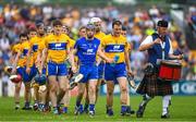 27 May 2018; Clare captain Patrick O'Connor, 2, leads the players, behind the St Patrick's Pipe Band, Tulla, during the parade before the Munster GAA Hurling Senior Championship Round 2 match between Clare and Waterford at Cusack Park in Ennis, Co Clare. Photo by Ray McManus/Sportsfile