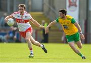 27 May 2018; Liam McGoldrick of Derry in action against Ryan McHugh of Donegal during the Ulster GAA Football Senior Championship Quarter-Final match between Derry and Donegal at Celtic Park in Derry. Photo by Oliver McVeigh/Sportsfile