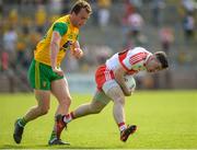 27 May 2018; Niall Toner of Derry in action against Ciaran McGinley of Donegal during the Ulster GAA Football Senior Championship Quarter-Final match between Derry and Donegal at Celtic Park in Derry. Photo by Oliver McVeigh/Sportsfile
