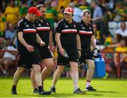 27 May 2018; Derry manager Damian McErlain, second from right, and part of his management team walking of the field at the end of the Ulster GAA Football Senior Championship Quarter-Final match between Derry and Donegal at Celtic Park in Derry. Photo by Oliver McVeigh/Sportsfile