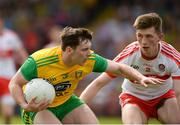27 May 2018; Jamie Brennan of Donegal  in action against Paul McNeill of Derry  during the Ulster GAA Football Senior Championship Quarter-Final match between Derry and Donegal at Celtic Park in Derry. Photo by Oliver McVeigh/Sportsfile