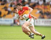 27 May 2018; Ciaran Moran of Carlow in action against Eanna O'Connor of Kildare during the Leinster GAA Football Senior Championship Quarter-Final match between Carlow and Kildare at O'Connor Park in Tullamore, Offaly. Photo by Matt Browne/Sportsfile