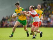 27 May 2018; Michael Langan of Donegal in action against Sean Leo McGoldrick of Derry during the Ulster GAA Football Senior Championship Quarter-Final match between Derry and Donegal at Celtic Park in Derry. Photo by Oliver McVeigh/Sportsfile