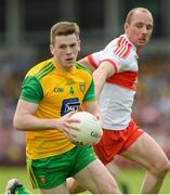 27 May 2018; Eoghan Bán Gallagher of Donegal in action against Sean Leo McGoldrick of Derry during the Ulster GAA Football Senior Championship Quarter-Final match between Derry and Donegal at Celtic Park in Derry. Photo by Oliver McVeigh/Sportsfile