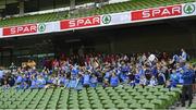30 May 2018; The SPAR FAI Primary School 5s National Finals took place in the Aviva Stadium on Wednesday, May 30th, where former Republic of Ireland International Keith Andrews and current Republic of Ireland women's footballer Megan Campbell were in attendance supporting as girls and boys from 13 counties battled it out for national honours. Scoil Assaim, Co. Dublin,fans after the Section C game between Scoil Assaim and Glasheen BNS.  Photo by Harry Murphy/Sportsfile