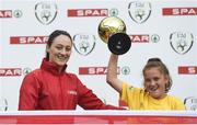 30 May 2018; The SPAR FAI Primary School 5s National Finals took place in the Aviva Stadium on Wednesday, May 30th, where former Republic of Ireland International Keith Andrews and current Republic of Ireland women's footballer Megan Campbell were in attendance supporting as girls and boys from 13 counties battled it out for national honours. Pictured is Jodie Loughrey of Scoil Íosagáin, Buncrana, Inishowen, Co. Donegal, with her Player of the Tournament Award and Republic of Ireland women's footballer Megan Campbell during the SPAR FAI Primary School 5s National Finals at Aviva Stadium in Dublin. Photo by Harry Murphy/Sportsfile