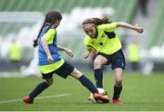 30 May 2018; Rebecca McGarry of Broadford Utd AFC, Co Limerick, in action against Jane Ryan of Ballymackey FC, Co Tipperary, during the Aviva Soccer Sisters Finals at the Aviva Stadium in Dublin. Photo by David Fitzgerald/Sportsfile