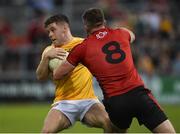 26 May 2018; Patrick McBride of Antrim in action against Peter Turley of Down during the Ulster GAA Football Senior Championship Quarter-Final match between Down and Antrim at Pairc Esler in Newry, Down. Photo by Oliver McVeigh/Sportsfile