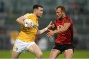 26 May 2018; Conor Murray of Antrim in action against Darren O'Hagan of Down during the Ulster GAA Football Senior Championship Quarter-Final match between Down and Antrim at Pairc Esler in Newry, Down. Photo by Oliver McVeigh/Sportsfile
