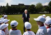 31 May 2018; Ronnie Delany was guest of honour at his alma mater, CUS Sports Day at College Park, Trinity College. CUS Junior School on Leeson Street is celebrating 150 years of the school. Teachers and children also joined to celebrate the 62nd anniversary of when Ronnie Delany became the first Irish man to break 4 minutes for the mile in Compton, USA, running 3:59.0 on June 1st, 1956, the same year he won gold over 1500m at the Olympic Games in Melbourne. Ronnie Delany is pictured addressing participants during The Ronnie Delany &quot;Smile Run&quot;, at College Park, Trinity College, Dublin. Photo by David Fitzgerald/Sportsfile