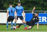 1 June 2018; Gary O'Neill of UCD is tackled by Anthony McAlavey of Cobh during the SSE Airtricity League First Division match between UCD and Cobh Ramblers at the UCD Bowl, Dublin. Photo by Eoin Smith/Sportsfile