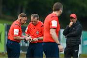 1 June 2018; Referee Ray Matthews confers with Fourth Official Alan Patchell, prior to leaving the field due to injury, during the SSE Airtricity League First Division match between UCD and Cobh Ramblers at the UCD Bowl, Dublin. Photo by Eoin Smith/Sportsfile