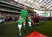 2 June 2018; John O'Shea of Republic of Ireland makes his way onto the pitch with his daughter Ruby and son Alfie prior to the International Friendly match between Republic of Ireland and the United States at the Aviva Stadium in Dublin.. Photo by Stephen McCarthy/Sportsfile