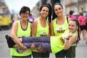 3 June 2018; Participants, from left, Catherine, Emma and Pamela Flood, and Leah O'Connor, from Coolock, Dublin, at the 2018 Vhi Women’s Mini Marathon. 30,000 women from all over the country took to the streets of Dublin to run, walk and jog the 10km route, raising much needed funds for hundreds of charities around the country. www.vhiwomensminimarathon.ie. Photo by Ramsey Cardy/Sportsfile