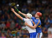 3 June 2018; Seán Hayes of Tipperary in action against Cian Wadding of Waterford during the Munster GAA Minor Hurling Championship Round 3 match between Waterford and Tipperary at Gaelic Grounds, Limerick. Photo by Piaras Ó Mídheach/Sportsfile