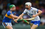 3 June 2018; Cian Wadding of Waterford in action against James Devaney of Tipperary during the Munster GAA Minor Hurling Championship Round 3 match between Waterford and Tipperary at Gaelic Grounds in Limerick. Photo by Piaras Ó Mídheach/Sportsfile