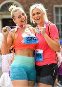 3 June 2018; Participants Anya Anna, left, and Christina Denise, from Dublin, following the 2018 Vhi Women’s Mini Marathon. 30,000 women from all over the country took to the streets of Dublin to run, walk and jog the 10km route, raising much needed funds for hundreds of charities around the country. www.vhiwomensminimarathon.ie Photo by Ramsey Cardy/Sportsfile