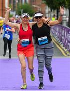 3 June 2018; Participants Sinead Tilley, left, and Denise Deary, from Templeogue, Dublin, following the 2018 Vhi Women’s Mini Marathon. 30,000 women from all over the country took to the streets of Dublin to run, walk and jog the 10km route, raising much needed funds for hundreds of charities around the country. www.vhiwomensminimarathon.ie Photo by Ramsey Cardy/Sportsfile