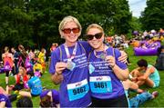 3 June 2018; Participants Breda Stenson, left, and Kathleen McNamee with their medals following the 2018 Vhi Women’s Mini Marathon. 30,000 women from all over the country took to the streets of Dublin to run, walk and jog the 10km route, raising much needed funds for hundreds of charities around the country. www.vhiwomensminimarathon.ie Photo by Ramsey Cardy/Sportsfile