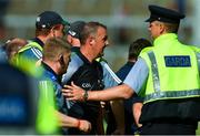 3 June 2018; Referee Alan Kelly is escorted off the field after the Munster GAA Senior Hurling Championship Round 3 match between Waterford and Tipperary at the Gaelic Grounds in Limerick. Photo by Piaras Ó Mídheach/Sportsfile