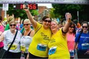 3 June 2018; Participants Samantha O'Brien, left,  and Sharon Maguire from Navan, Co. Meath, folllowing the 2018 Vhi Women’s Mini Marathon. 30,000 women from all over the country took to the streets of Dublin to run, walk and jog the 10km route, raising much needed funds for hundreds of charities around the country. www.vhiwomensminimarathon.ie Photo by Sam Barnes/Sportsfile