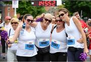 3 June 2018;  Participants react after finishing the 2018 Vhi Women’s Mini Marathon. 30,000 women from all over the country took to the streets of Dublin to run, walk and jog the 10km route, raising much needed funds for hundreds of charities around the country. www.vhiwomensminimarathon.ie Photo by Sam Barnes/Sportsfile