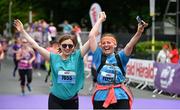 3 June 2018; Participants react after finishing the 2018 Vhi Women’s Mini Marathon. 30,000 women from all over the country took to the streets of Dublin to run, walk and jog the 10km route, raising much needed funds for hundreds of charities around the country. www.vhiwomensminimarathon.ie Photo by Sam Barnes/Sportsfile
