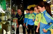 5 June 2018; Celebrating the launch of the new ’20 Years’ annual exhibition at the GAA Museum are, Senior GAA Museum Tour Guide, Cian Nolan, with from left, Tara Fogarty, 11, Martin Cleere, 12, Cathal Guilfoyle, 12, and Reah Sweeny, 11, all from Tipperary, at Croke Park in Dublin.  The exhibition traces the key moments in GAA and Croke Park history over the past 20 years since the GAA Museum first opened its doors in 1998. Topics covered include the Croke Park redevelopment, the deletion of Rule 21, the suspension of Rule 42 that paved the way for international rugby and soccer to be played in Croke Park, the Special Olympics World Summer Games in 2003 and the GAA 125 festivities in 2009. The exhibition also serves as the throw-in for the GAA Museum’s anniversary programme of events. Details of all the museum’s celebratory activities can be found at www.crokepark.ie/gaamuseum.  Photo by Sam Barnes/Sportsfile
