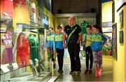 5 June 2018; Celebrating the launch of the new ’20 Years’ annual exhibition at the GAA Museum are, Senior GAA Museum Tour Guide, Cian Nolan, with from left, Tara Fogarty, 11, Martin Cleere, 12, Cathal Guilfoyle, 12, and Reah Sweeny, 11, all from Tipperary, at Croke Park in Dublin. The exhibition traces the key moments in GAA and Croke Park history over the past 20 years since the GAA Museum first opened its doors in 1998. Topics covered include the Croke Park redevelopment, the deletion of Rule 21, the suspension of Rule 42 that paved the way for international rugby and soccer to be played in Croke Park, the Special Olympics World Summer Games in 2003 and the GAA 125 festivities in 2009. The exhibition also serves as the throw-in for the GAA Museum’s anniversary programme of events. Details of all the museum’s celebratory activities can be found at www.crokepark.ie/gaamuseum.  Photo by Sam Barnes/Sportsfile