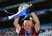 6 June 2018; St. Brigid's NS Castleknock captain Iseult Costello lifts the cup after their win over Loreto PS, Rathfarnham, in the Corn Bean Ui Phuirseil Final during Day 2 of the Allianz Cumann na mBunscol finals at Croke Park in Dublin. Photo by Piaras Ó Mídheach/Sportsfile