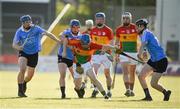 6 June 2018; Niall Lynam of Carlow in action against, from left, Conor Burke, David Keogh, and Ciaran Dowling of Dublin during the Bord Gais Energy Leinster Under 21 Hurling Championship 2018 Round 2 match between Carlow and Dublin at Netwatch Cullen Park in Carlow. Photo by Matt Browne/Sportsfile