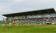 26 May 2018; Both teams parade behind the Kiltubrid Pipe Band before the Connacht GAA Football Senior Championship semi-final match between Leitrim and Roscommon at Páirc Seán Mac Diarmada in Carrick-on-Shannon, Leitrim. Photo by Piaras Ó Mídheach/Sportsfile