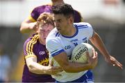 9 June 2018; JJ Hutchinson of Waterford in action against Michael Furlong of Wexford during the GAA Football All-Ireland Senior Championship Round 1 match between Wexford and Waterford at Innovate Wexford Park in Wexford. Photo by Matt Browne/Sportsfile
