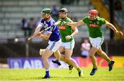 9 June 2018; Neil Foyle of Laois in action against Darragh Kelly and Seán Geraghty, right, of Meath during the Joe McDonagh Cup Round 5 match between Meath and Laois at Páirc Táilteann in Navan, Co Meath. Photo by Stephen McCarthy/Sportsfile