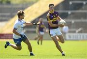 9 June 2018; Eoghan Nolan of Wexford in action against Brian Looby of Waterford during the GAA Football All-Ireland Senior Championship Round 1 match between Wexford and Waterford at Innovate Wexford Park in Wexford. Photo by Matt Browne/Sportsfile