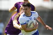 9 June 2018; JJ Hutchinson of Waterford in action against Michael Furlong of Wexford during the GAA Football All-Ireland Senior Championship Round 1 match between Wexford and Waterford at Innovate Wexford Park in Wexford. Photo by Matt Browne/Sportsfile